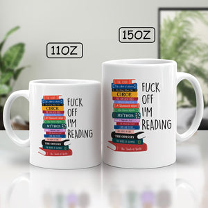 Personalized book lover mug with colorful book stack and humorous text for reading enthusiasts
