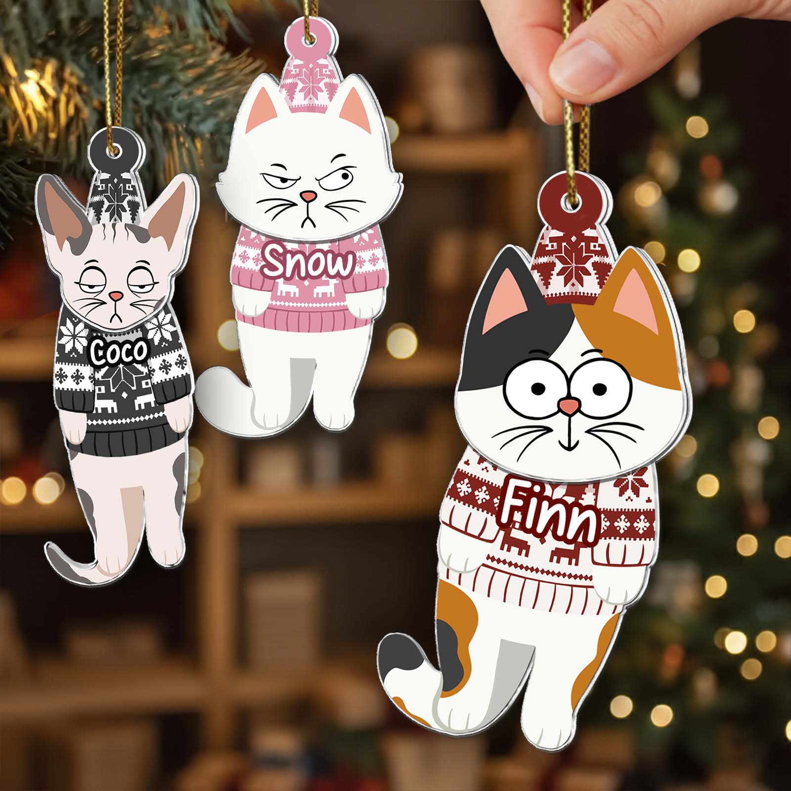 Three personalized cat Christmas ornaments featuring cute cats in festive sweaters