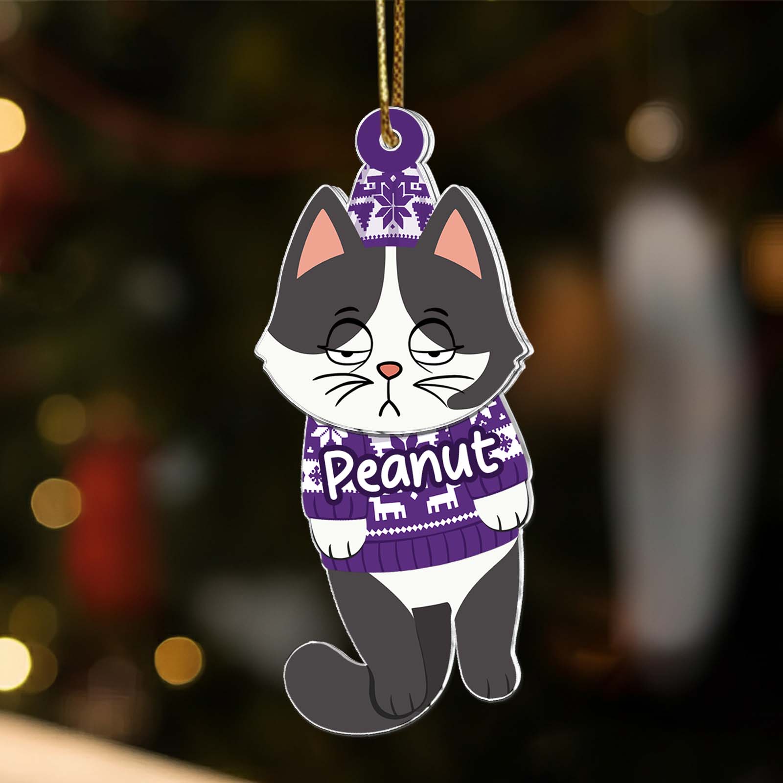 Personalized cat Christmas ornament featuring a gray cat wearing a sweater with the name Peanut