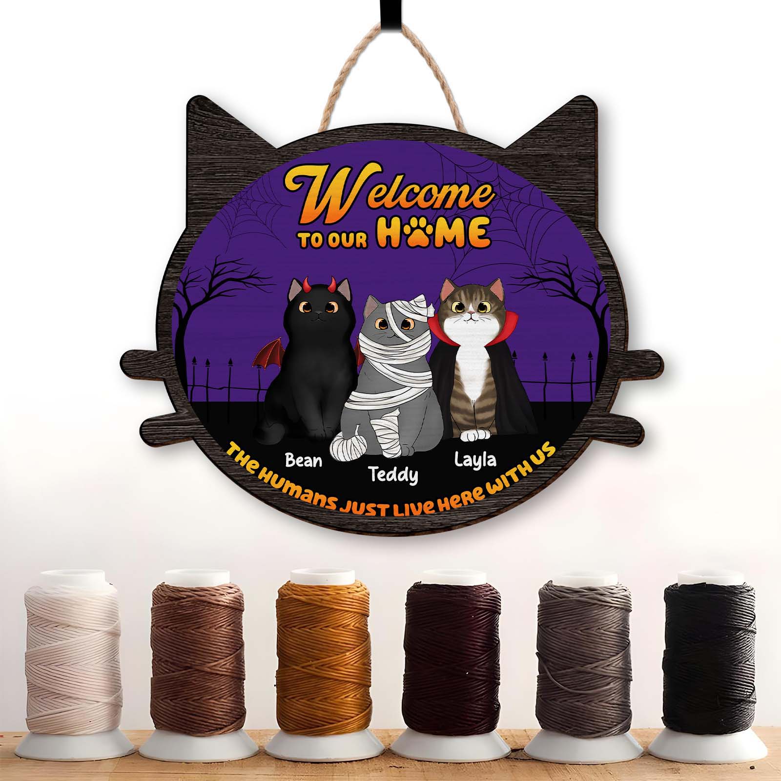 Personalized cat door sign featuring three cartoon cats with a Halloween theme, welcoming guests home