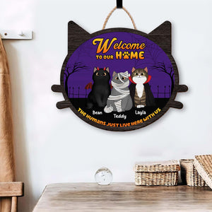 Personalized cat door sign featuring cartoon cats and welcoming message for pet lovers