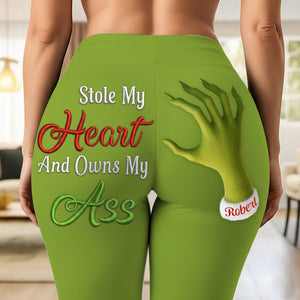 Personalized Christmas leggings featuring a fun Grinch design with text for holiday cheer