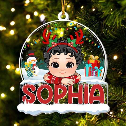 Personalized Christmas ornament for kids featuring a cute cartoon child with reindeer antlers and the name Sophia
