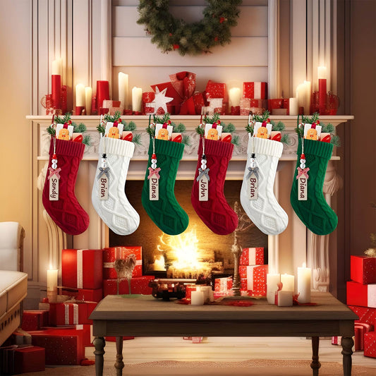 Festive personalized Christmas stockings in red, white, and green hanging on a mantel above a cozy fireplace