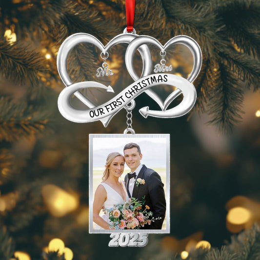 Personalized couple Christmas ornament featuring intertwined hearts and a photo frame for 2023 memories