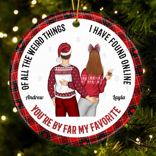 Personalized couple Christmas ornament with a couple in holiday sweaters and names Andrew and Layla