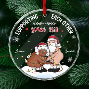 Personalized couple Christmas ornament with playful design featuring festive characters and custom names