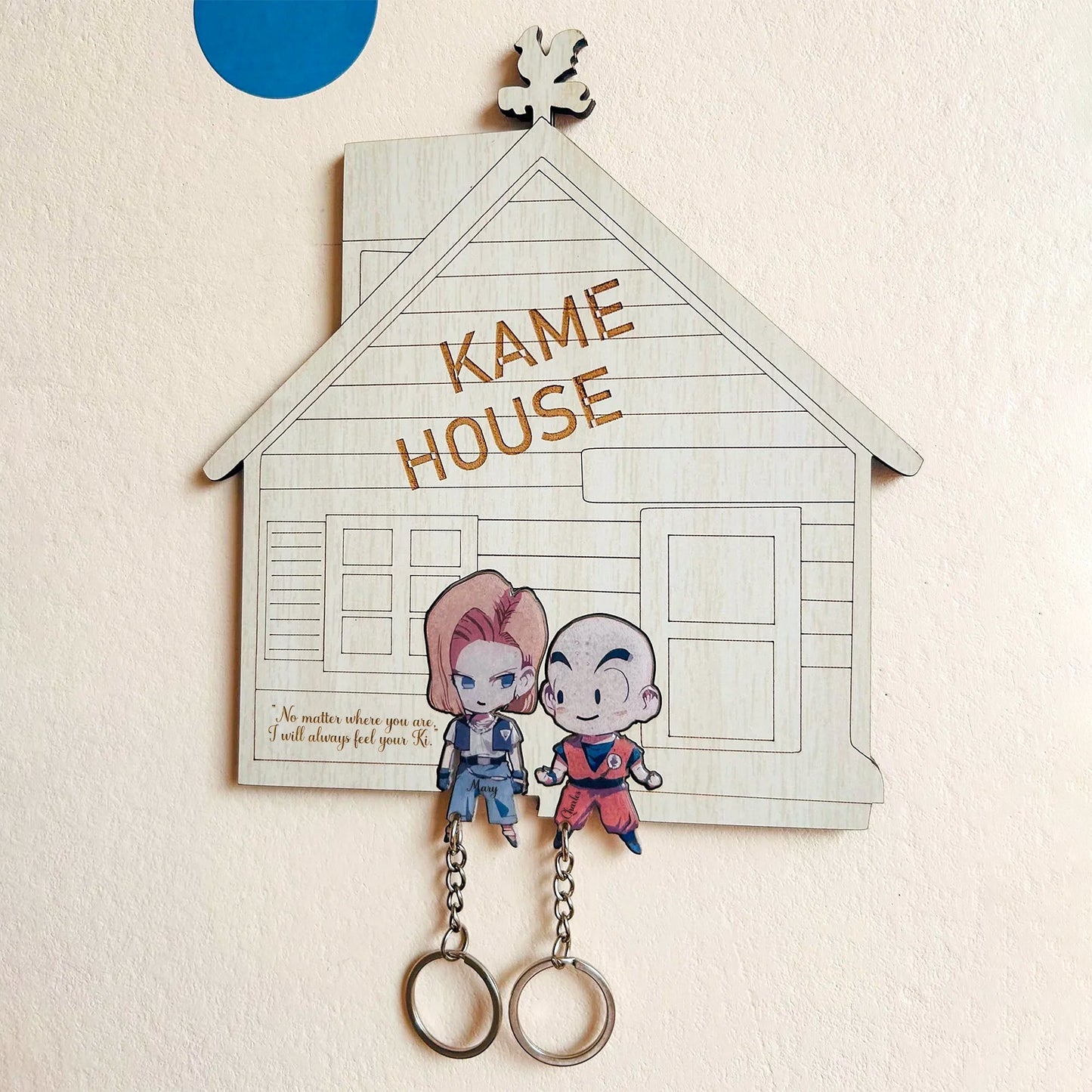 Personalized couple key holder shaped like a house featuring cute characters and space for keys