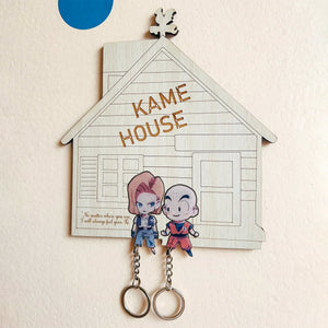Personalized couple key holder shaped like a house featuring cute characters and space for keys