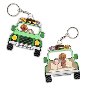 Personalized couple keychain featuring cartoon couple inside a green truck with custom names