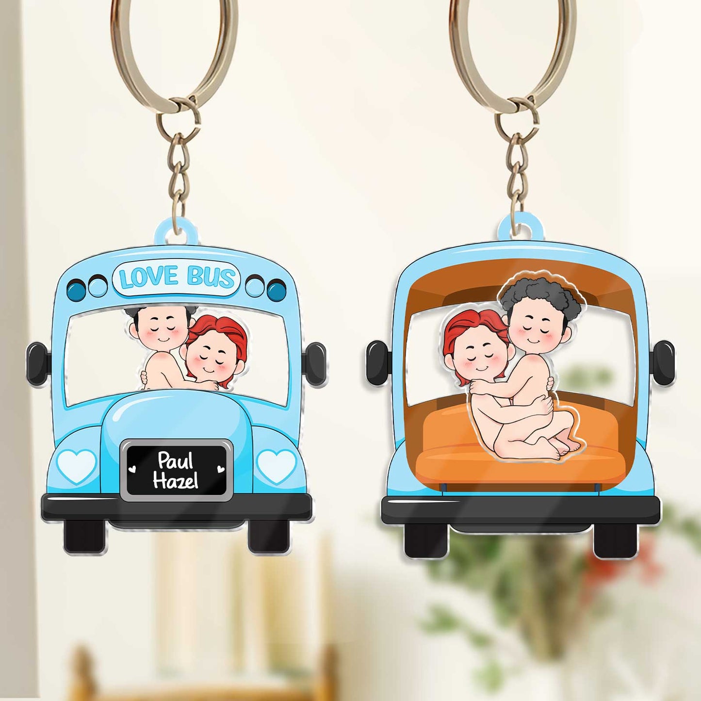 Personalized couple keychain featuring a love bus design with cute cartoon couple and custom names