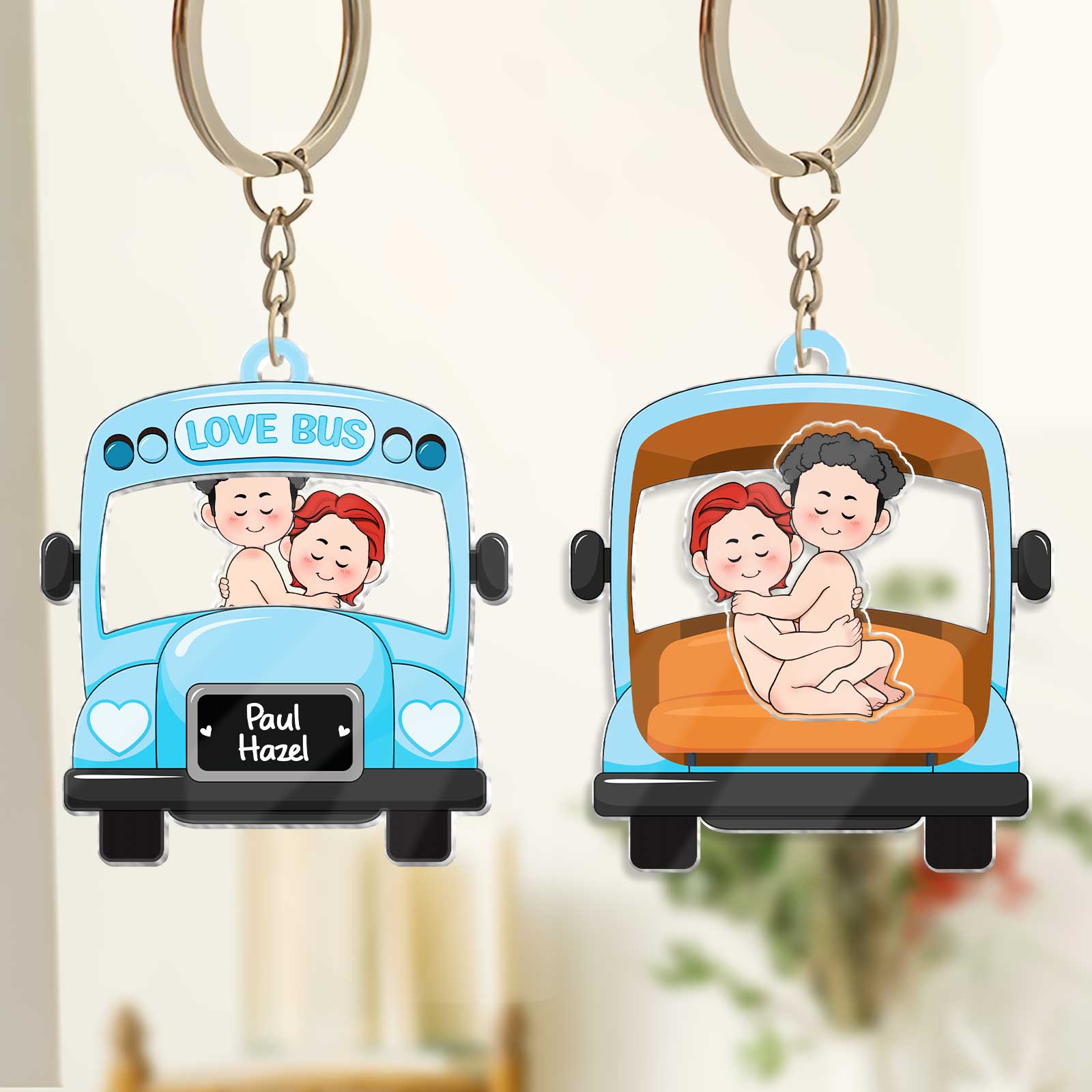 Personalized couple keychain featuring a love bus design with cute cartoon couple and custom names