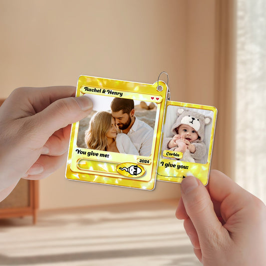 Personalized couple keychain from 365Gifty with custom photos of a couple and a baby in yellow frames