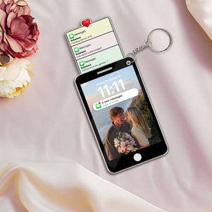 Personalized couple keychain featuring a smartphone design with romantic message notifications