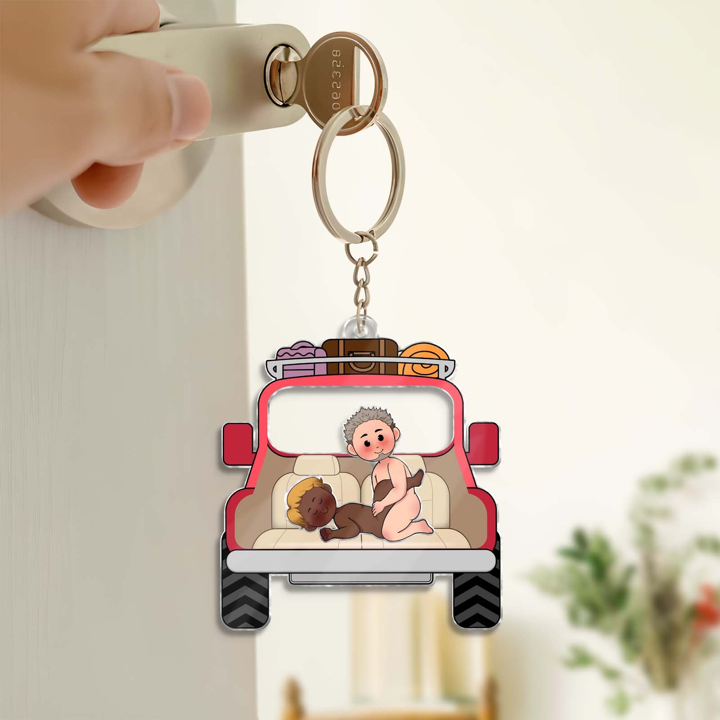 Personalized couple keychain featuring a cartoon of two characters in a red truck for unique gifts