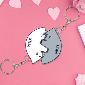 Personalized couple keychain set featuring two cat-shaped keychains with names Peter and Oliva on a pink background