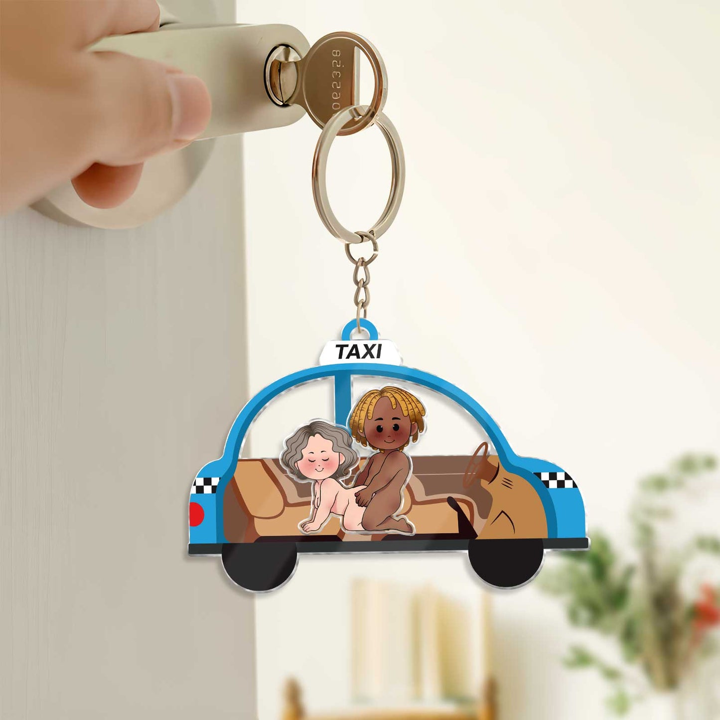 Personalized couple keychain featuring cartoon couple in a taxi for a unique gift idea