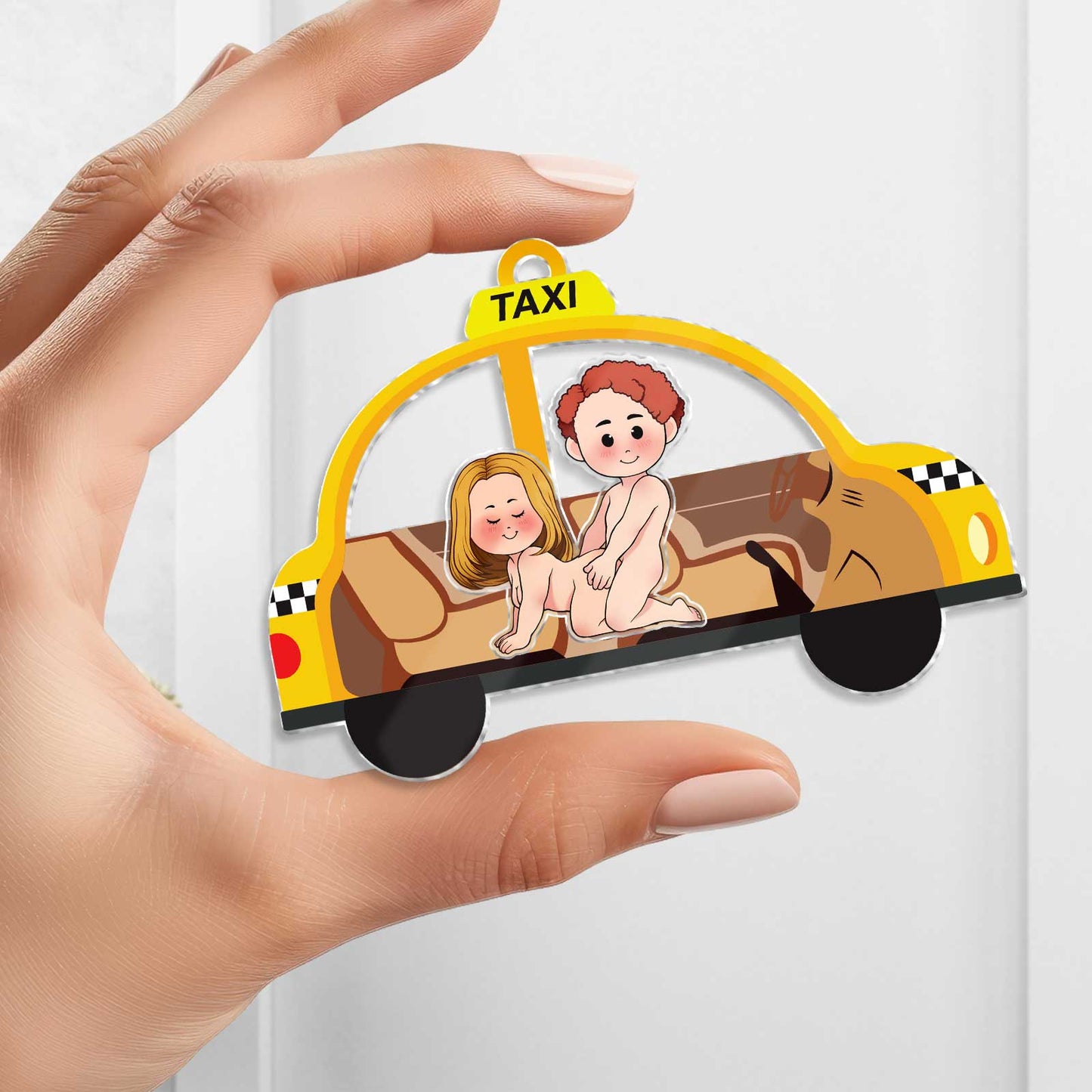 Personalized couple keychain featuring a cute cartoon couple in a taxi design