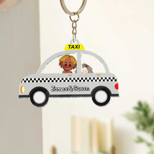 Personalized couple keychain featuring a taxi design with James and Susan for couples