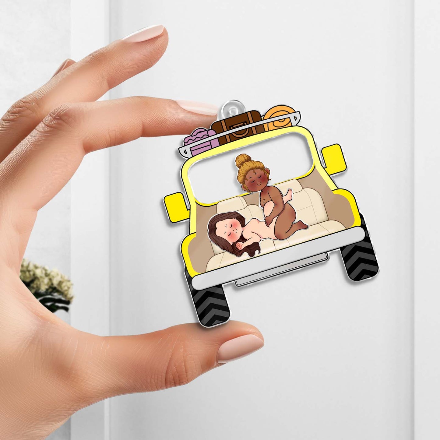 Personalized couple keychain featuring a cute cartoon couple in a colorful car design
