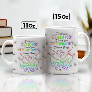 Personalized couple mug featuring colorful heart designs and customizable names for a unique gift
