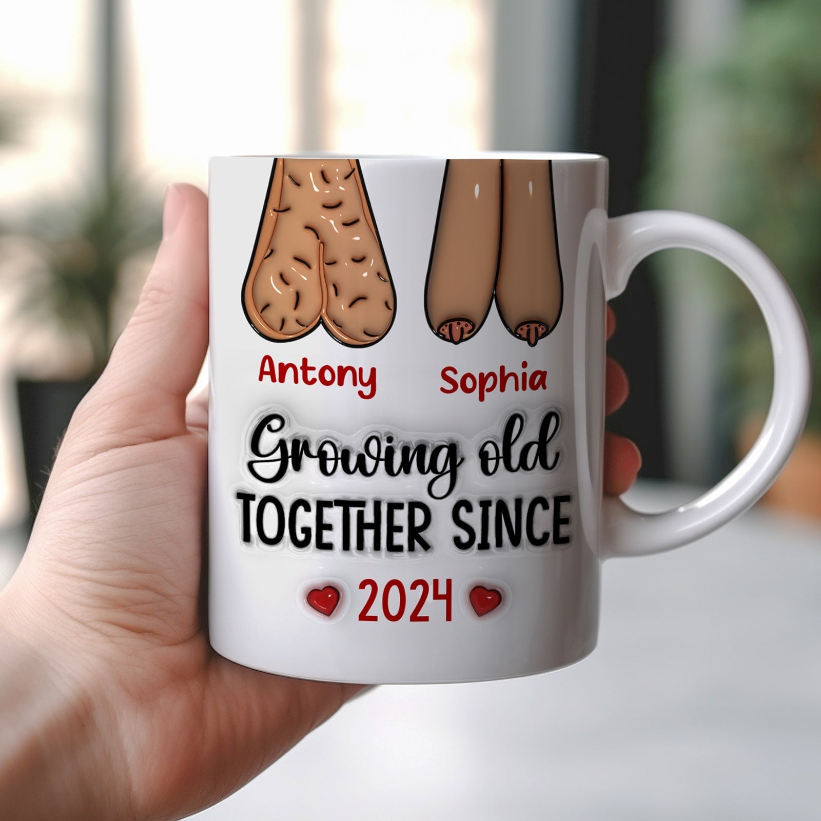 Personalized couple mug featuring cartoon hands and the names Antony and Sophia with the text Growing Old Together Since 2024