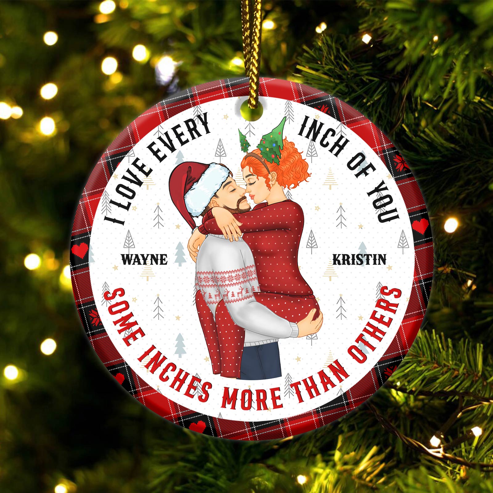 Personalized couple ornament with a hugging couple and custom names on a Christmas tree