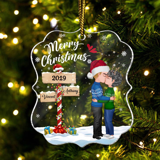 Personalized couple ornament with kissing couple, Merry Christmas text, and 2019 date sign