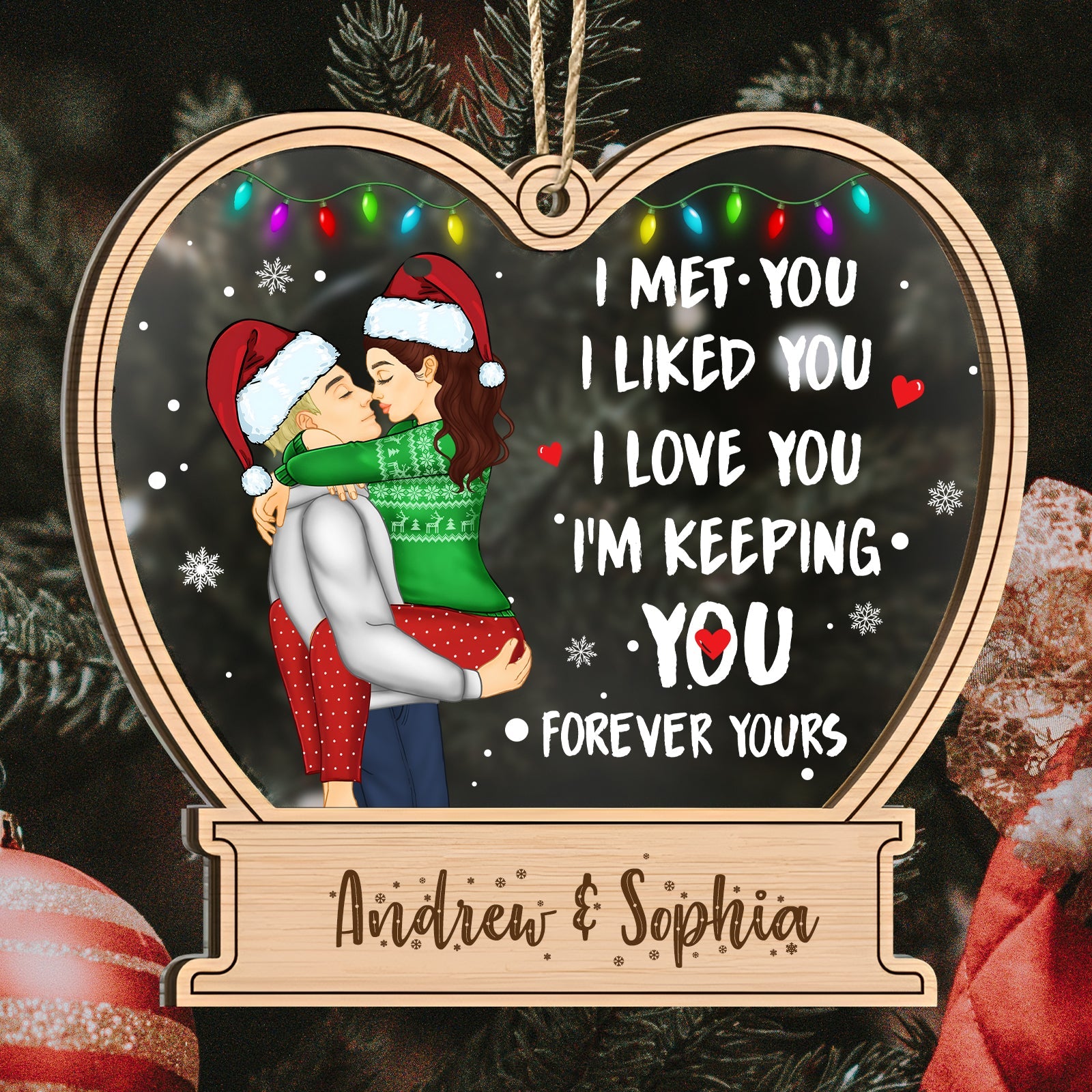 Personalized couple ornament with a heart shape featuring a couple in Christmas attire and romantic quote