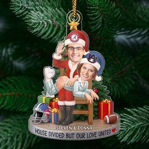 Personalized couple photo ornament featuring festive couple with sports team hats and Christmas decorations