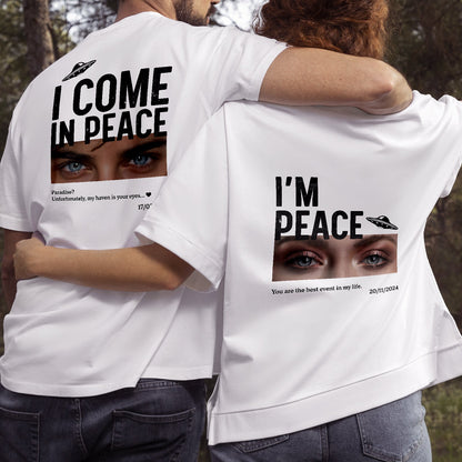 Personalized couple t-shirt set with matching peace-themed design and photo prints on white fabric