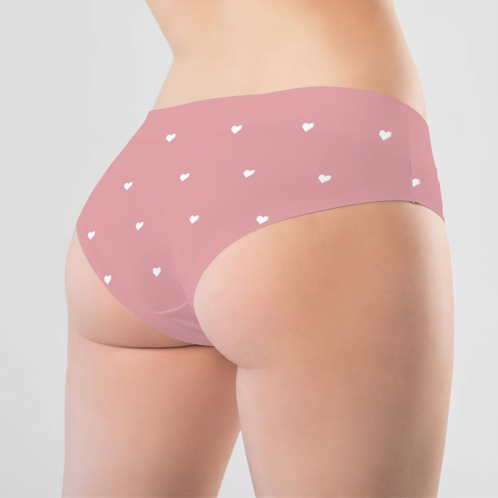 Personalized couple underwear in soft pink with white heart patterns for romantic couples