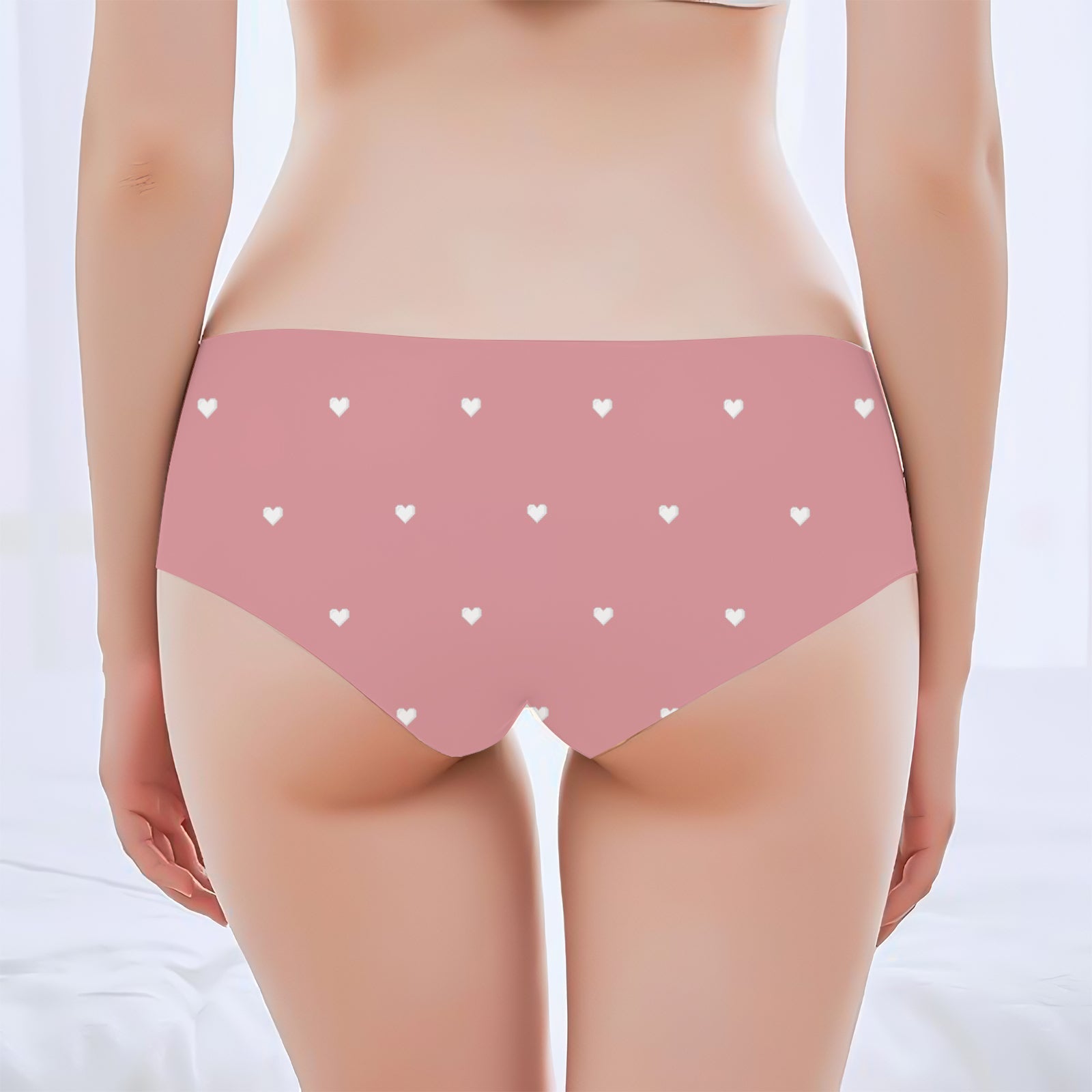 Pink personalized couple underwear with small heart patterns for romantic gifting