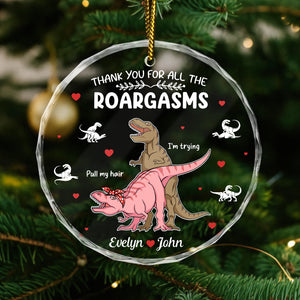 Personalized dinosaur glass ornament featuring playful T-Rex characters and a heartfelt message