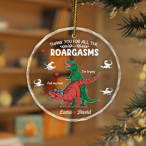 Personalized dinosaur glass ornament featuring colorful T-Rex and Velociraptor designs with heartfelt message