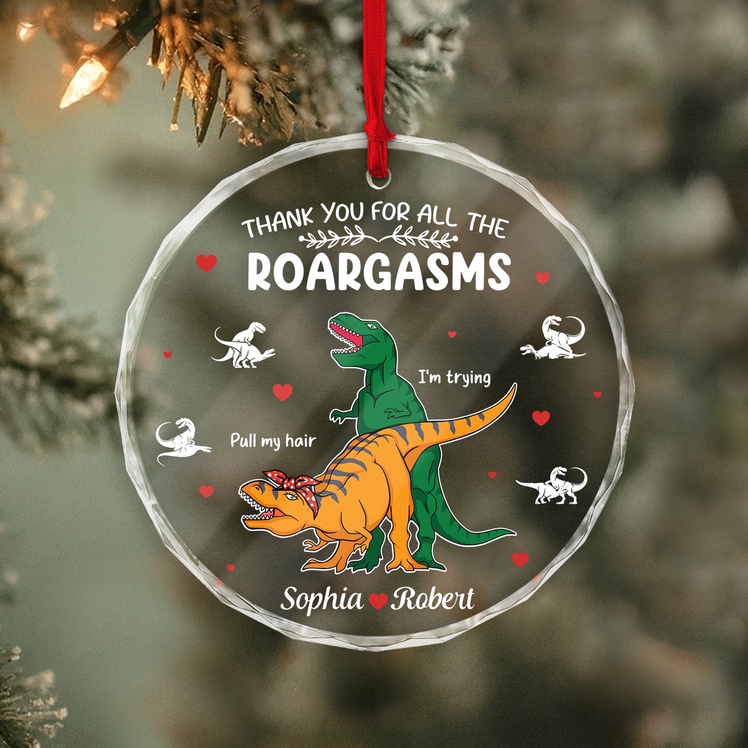 Personalized dinosaur glass ornament featuring colorful dinosaurs and a heartfelt message