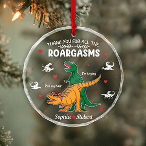 Personalized dinosaur glass ornament featuring colorful dinosaurs and a heartfelt message