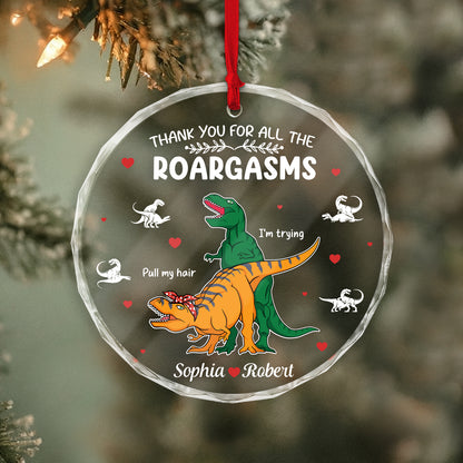 Personalized dinosaur glass ornament featuring colorful dinosaurs and a heartfelt message
