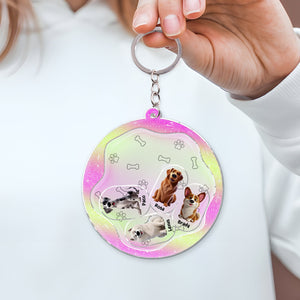 Personalized dog mom keychain featuring colorful dog illustrations and bone patterns