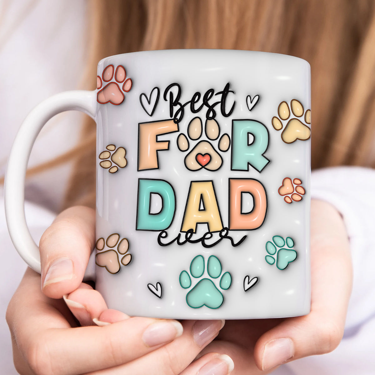 Personalized dog mom mug with colorful paw prints and the phrase Best Dog Dad Ever