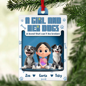 Personalized dog ornament featuring a girl with her two dogs and custom names Zoe, Carla, and Toby