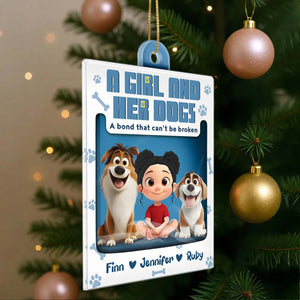 Personalized dog ornament featuring a girl with her dogs and custom names for a heartfelt holiday decoration