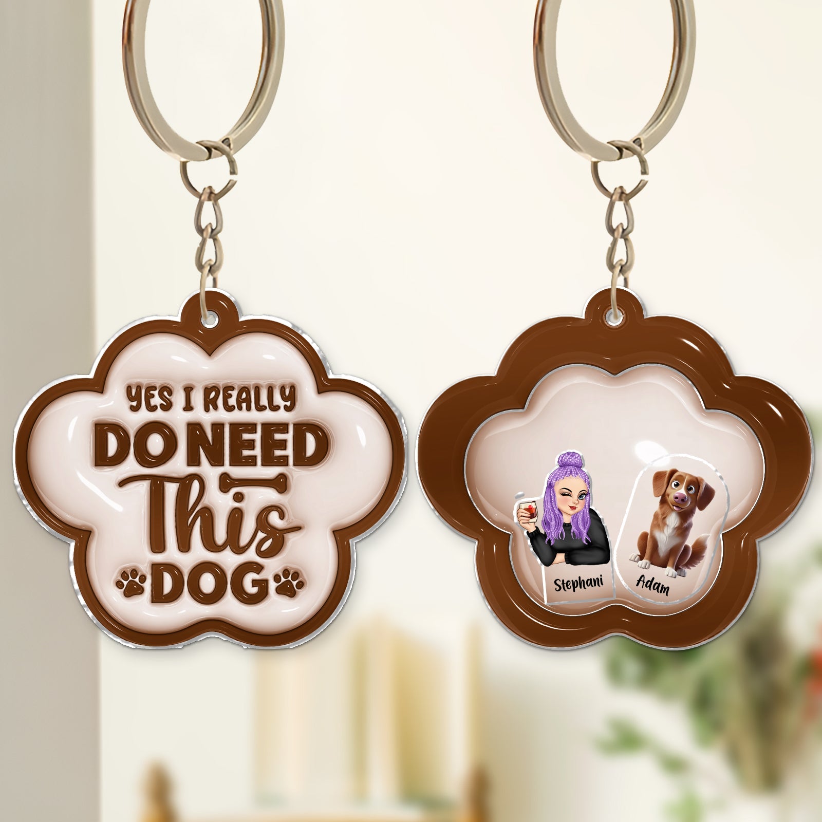 Personalized dog shaking keychain featuring unique design with custom names for pet lovers