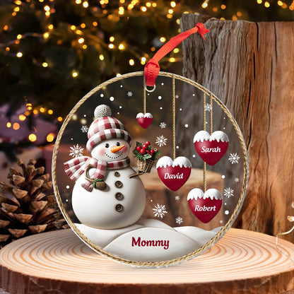 Personalized family Christmas ornament with snowman and red heart name tags hanging inside a circular frame