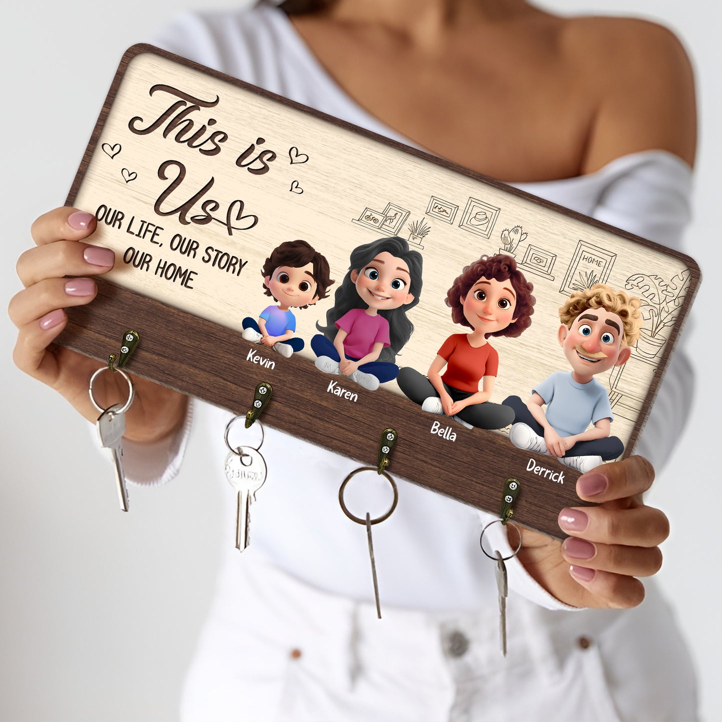 Personalized family key holder featuring cartoon characters and engraved names for a unique home decoration