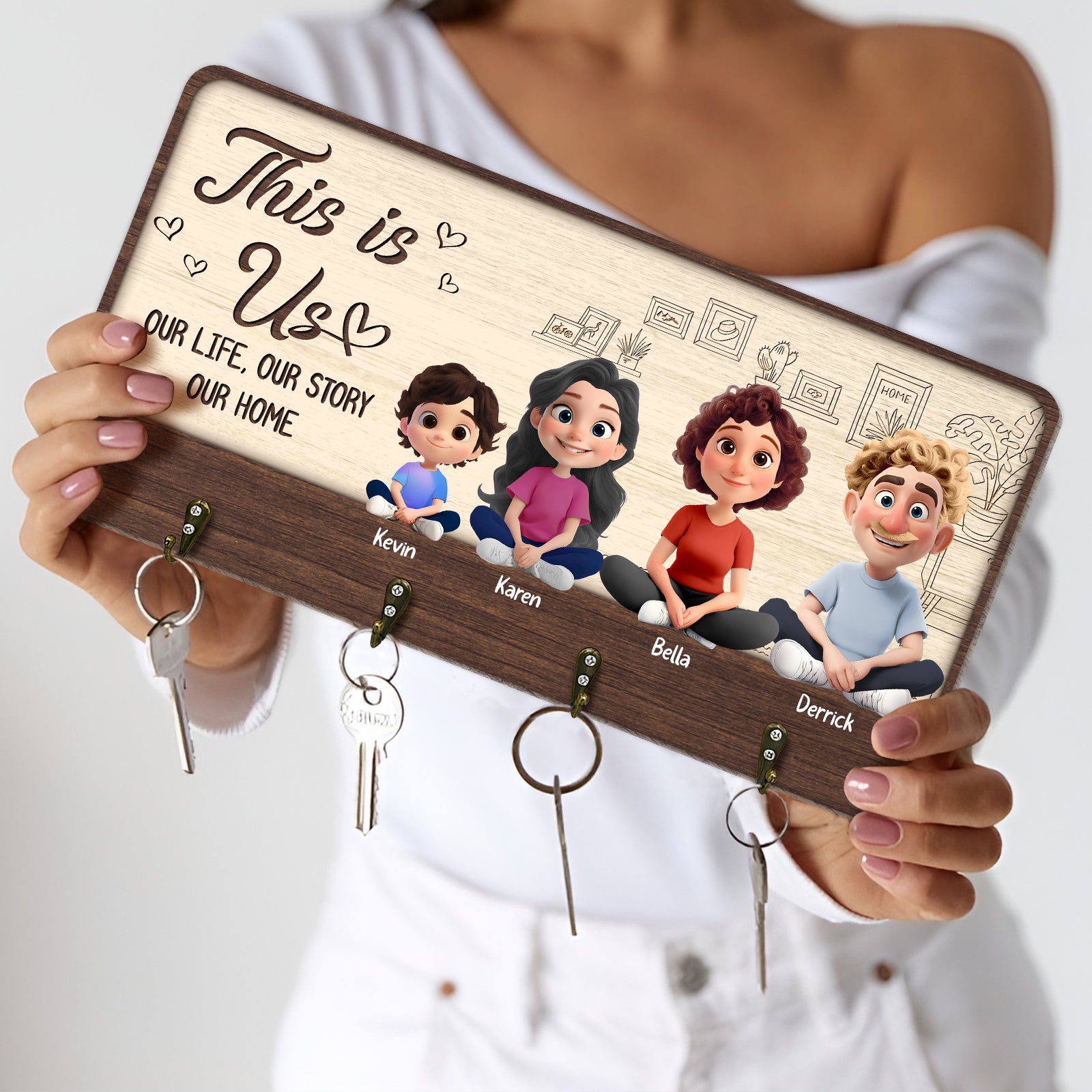 Personalized family key holder featuring cartoon characters and engraved names for a unique home decoration