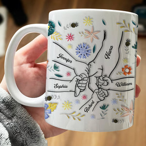 Personalized family mug featuring intertwined hands and names for a custom family gift
