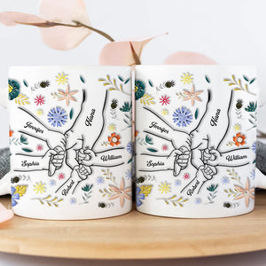 Personalized family mug featuring illustrated hands and floral designs with names of family members