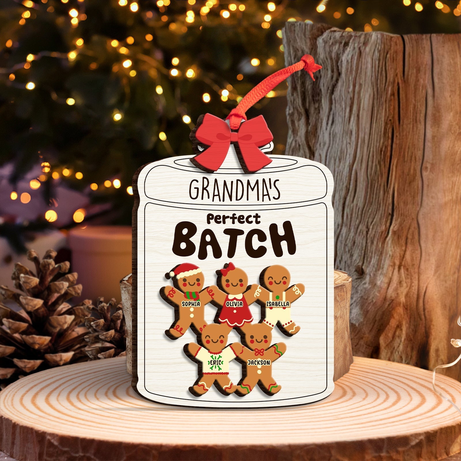 Personalized family wooden ornament featuring gingerbread figures in a jar labeled 'Grandma's Perfect Batch'