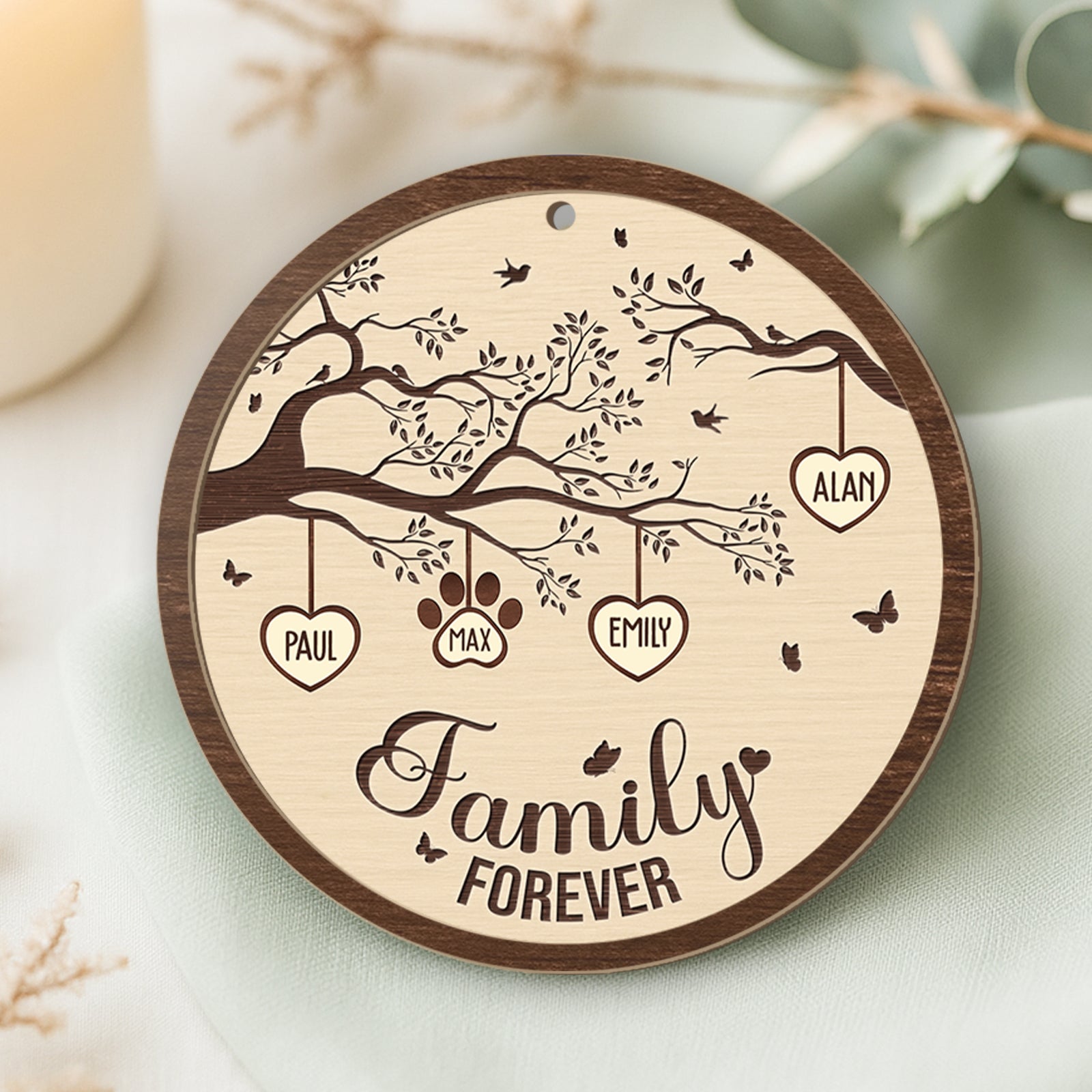 Personalized family wooden ornament featuring names and a tree design for cherished memories